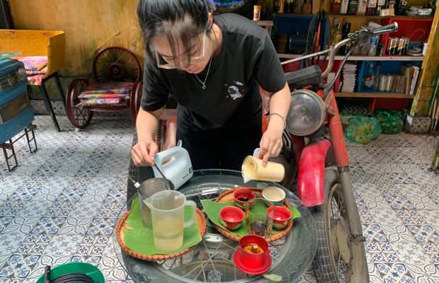 Learning to make the egg coffee at Hidden Gem Cafe